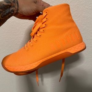 Woman’s high top NoBull trainers. Neon Orange